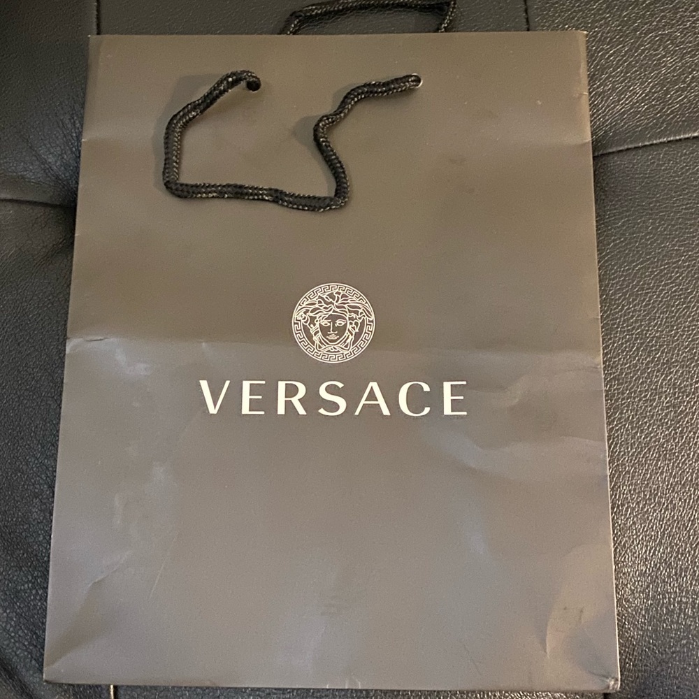 Versace bag with pouch included